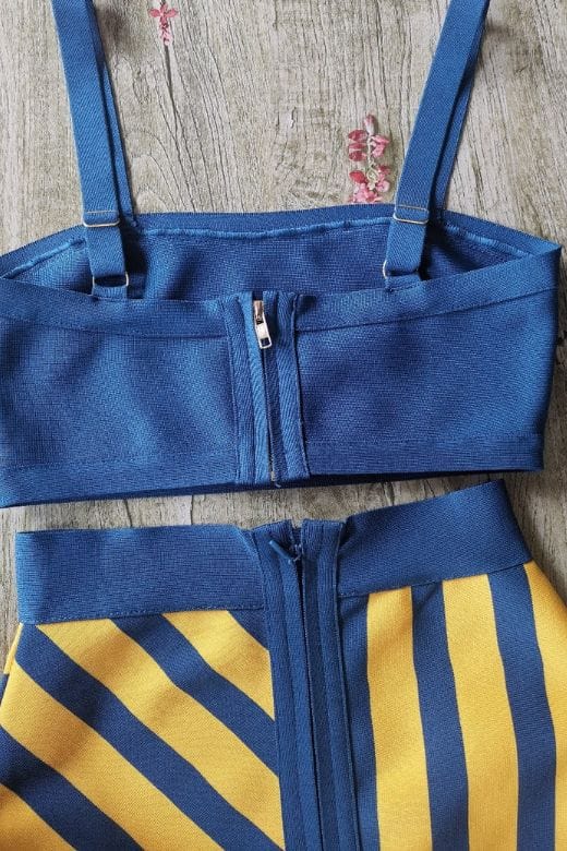 Woman wearing a figure flattering Nadia Bandage Crop Top and Midi Skirt Set - Royal Blue BODYCON COLLECTION