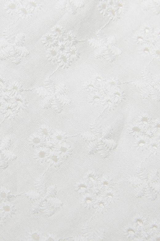 Woman wearing a figure flattering Nancy Bodycon Top - Pearl White BODYCON COLLECTION