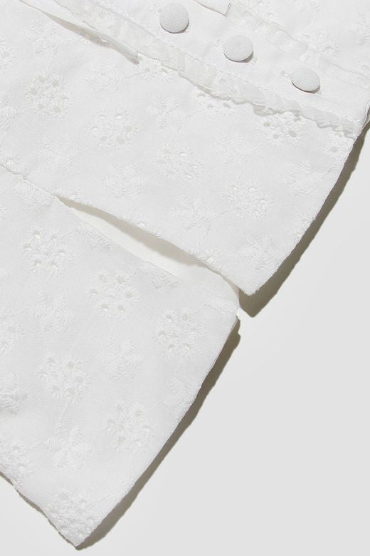 Woman wearing a figure flattering Nancy Bodycon Top - Pearl White BODYCON COLLECTION