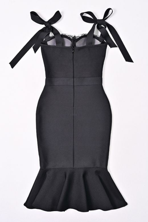 Woman wearing a figure flattering Nora Bandage Midi Dress - Classic Black BODYCON COLLECTION