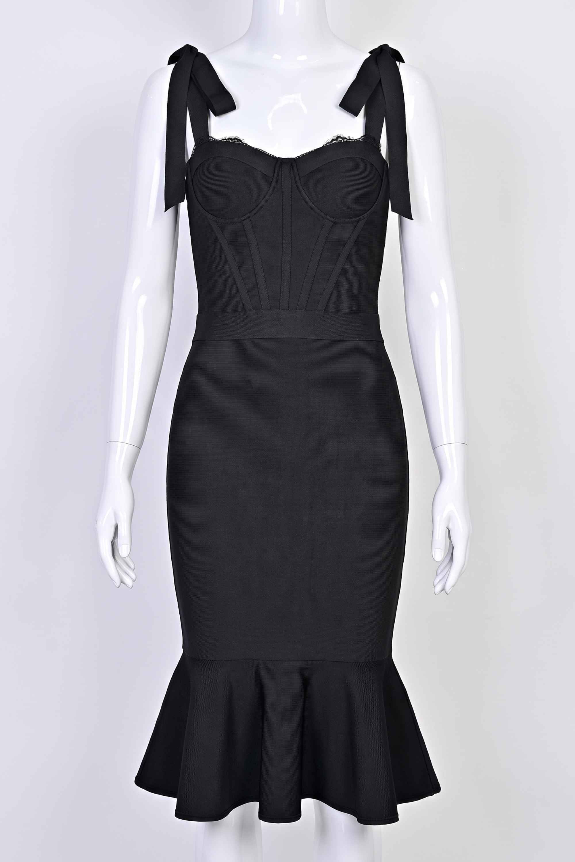 Woman wearing a figure flattering Nora Bandage Midi Dress - Classic Black BODYCON COLLECTION