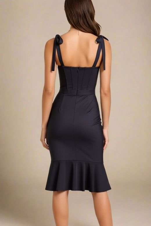 Woman wearing a figure flattering  Nora Bandage Midi Dress - Classic Black BODYCON COLLECTION
