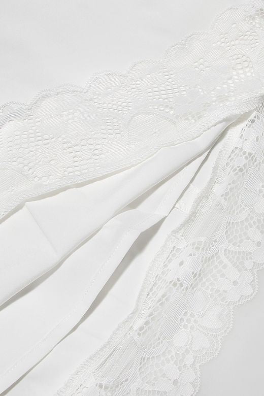 Woman wearing a figure flattering Nori Bodycon Mini Dress - Classic Black BODYCON COLLECTION