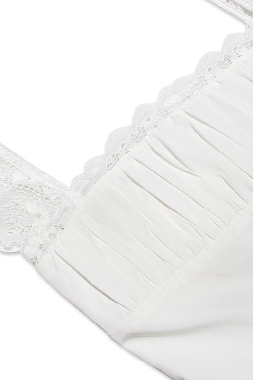 Woman wearing a figure flattering Nori Bodycon Mini Dress - Pearl White BODYCON COLLECTION