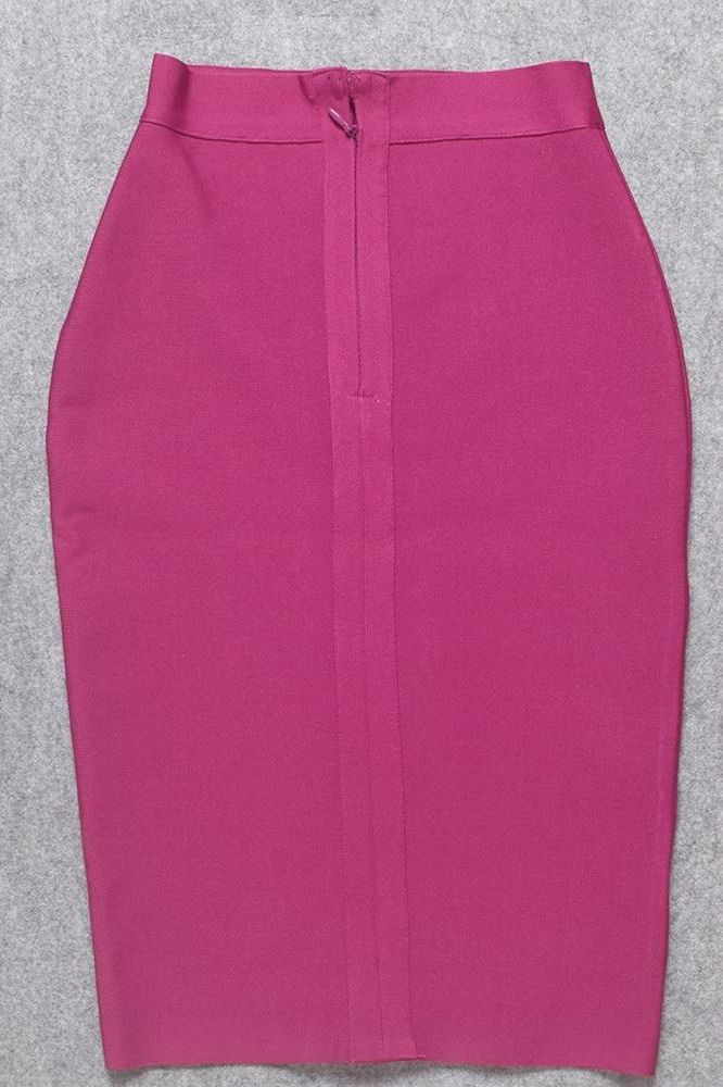 Woman wearing a figure flattering Pencil High Waist Bandage Knee Length Skirt - Magenta Pink BODYCON COLLECTION