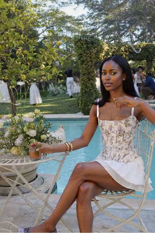 Woman wearing a figure flattering Penny Corset Top - Beige Cream BODYCON COLLECTION Pty Ltd