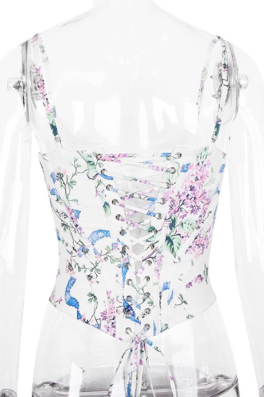 Woman wearing a figure flattering Penny Corset Top - White Floral BODYCON COLLECTION Pty Ltd