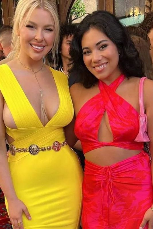 Woman wearing a figure flattering Pia Bandage Dress - Sun Yellow BODYCON COLLECTION