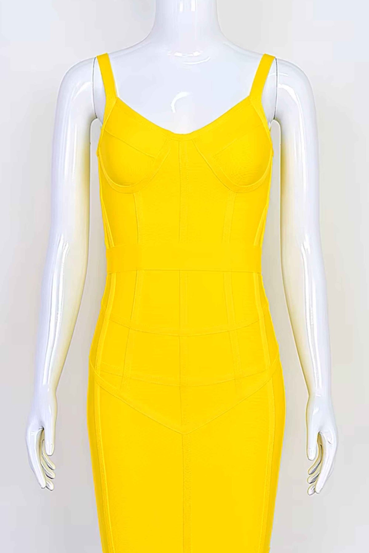Woman wearing a figure flattering Pip Bandage Corset Dress - Sun Yellow Bodycon Collection