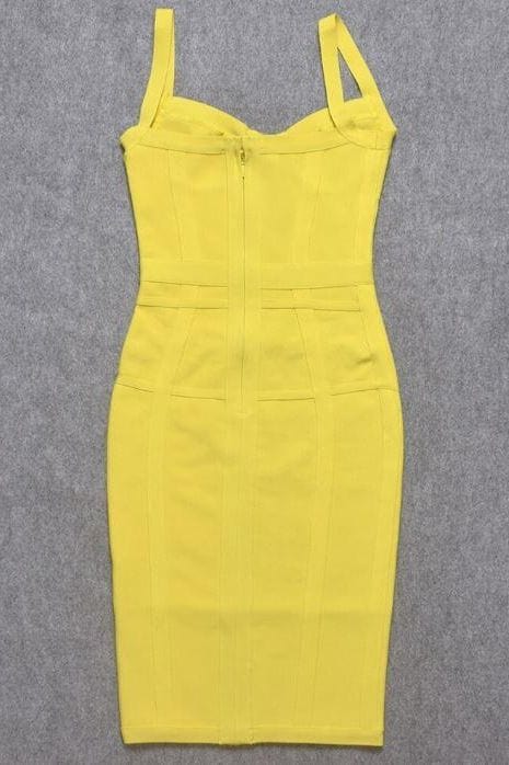 Woman wearing a figure flattering Pip Bandage Corset Dress - Sun Yellow Bodycon Collection