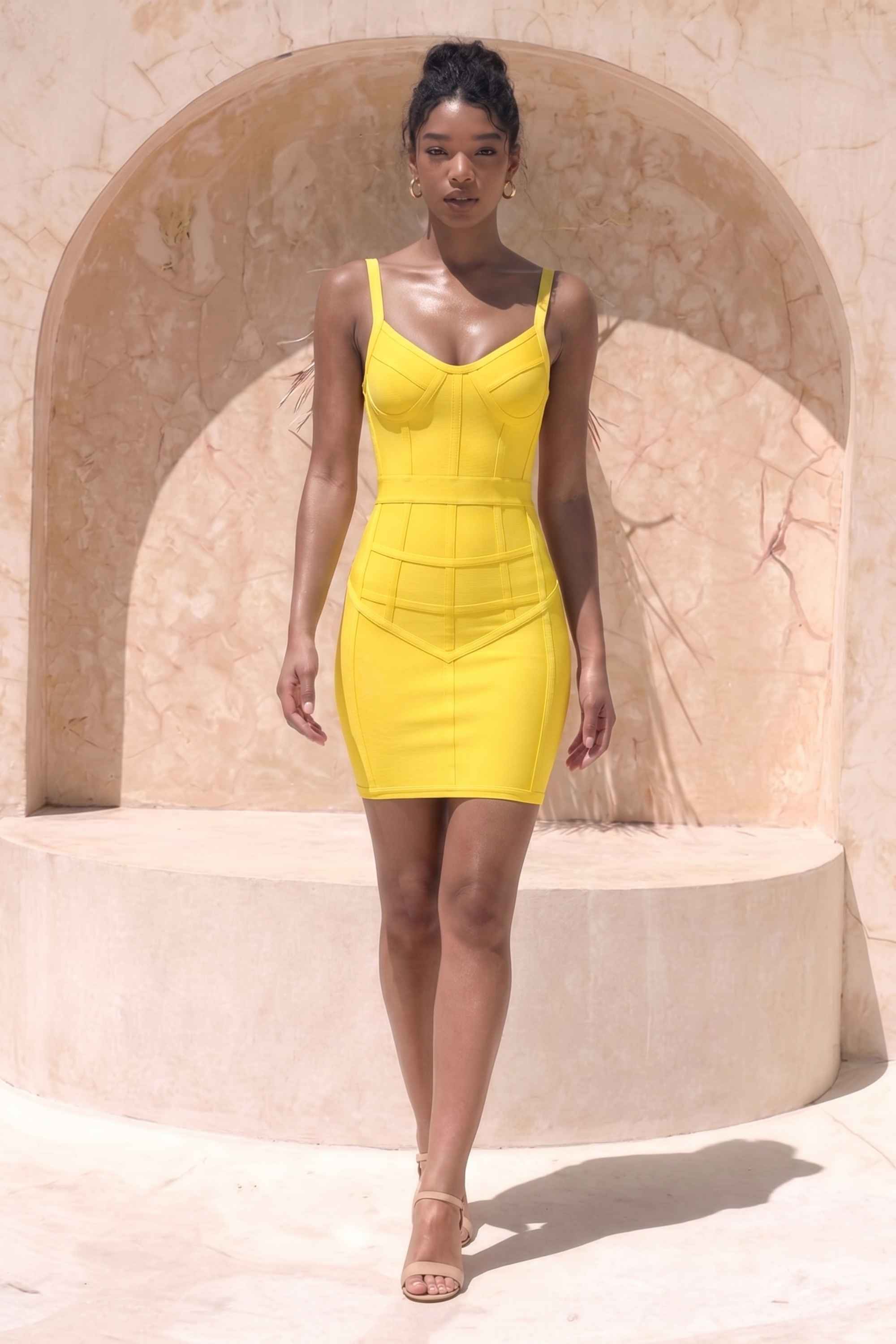 Woman wearing a figure flattering Pip Bandage Mini Dress - Sun Yellow BODYCON COLLECTION