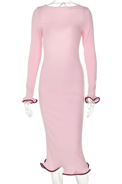 Woman wearing a figure flattering Regina Long Sleeve Bodycon Maxi Dress - Ivory White BODYCON COLLECTION