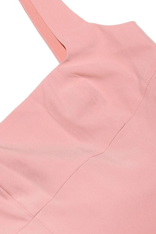 Woman wearing a figure flattering Rian Bodycon Mini Dress - Dusty Pink BODYCON COLLECTION