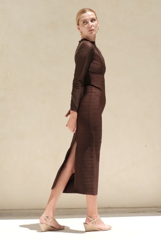 Woman wearing a figure flattering Robin Long Sleeve Bandage Maxi Dress - Tan Brown BODYCON COLLECTION Pty Ltd