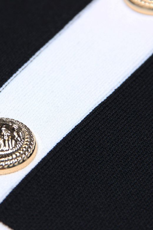 Woman wearing a figure flattering Rosie Bodycon Dress - Classic Black BODYCON COLLECTION