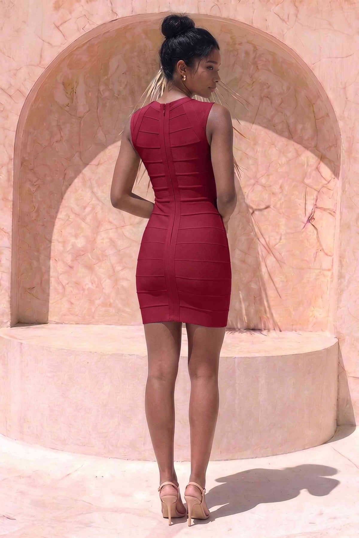 Woman wearing a figure flattering Sabrina Bandage Mini Dress - Red Wine BODYCON COLLECTION Pty Ltd