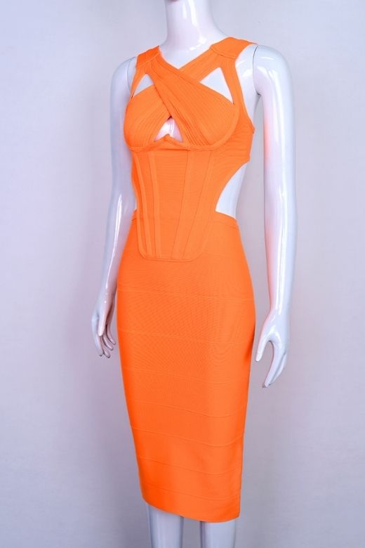 Woman wearing a figure flattering Sasha Bandage Midi Dress - Apricot Orange BODYCON COLLECTION