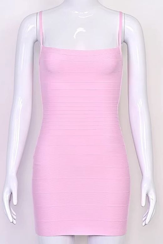 Woman wearing a figure flattering Scarlett Bandage Mini Dress - Dusty Pink BODYCON COLLECTION Pty Ltd
