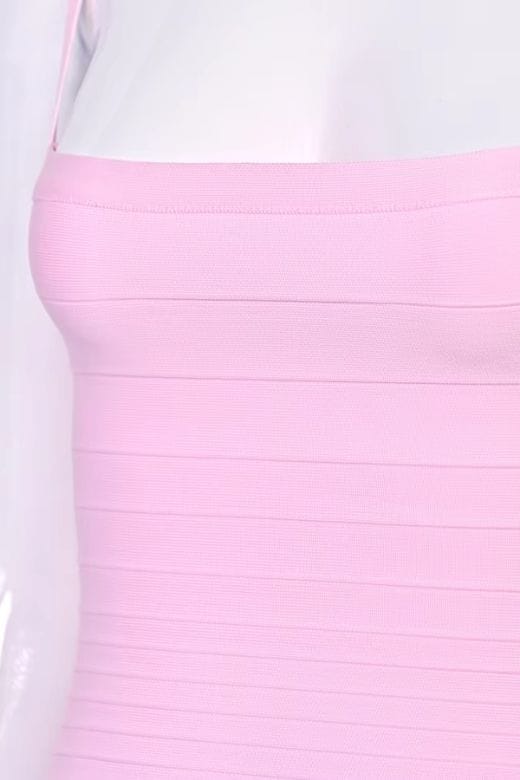 Woman wearing a figure flattering Scarlett Bandage Tank Top - Dusty Pink BODYCON COLLECTION Pty Ltd