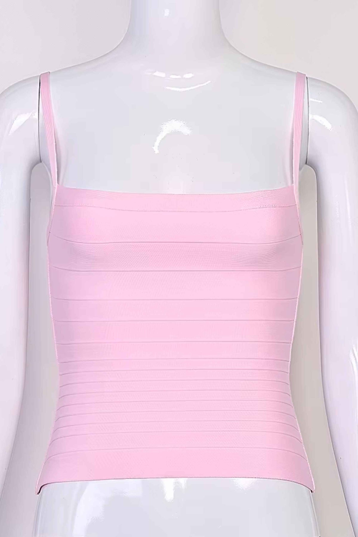 Woman wearing a figure flattering Scarlett Bandage Tank Top - Dusty Pink BODYCON COLLECTION Pty Ltd