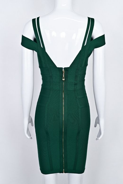 Woman wearing a figure flattering Sia Bandage Dress - Emerald Green Bodycon Collection
