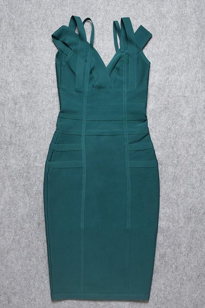 Woman wearing a figure flattering Sia Bandage Dress - Emerald Green Bodycon Collection