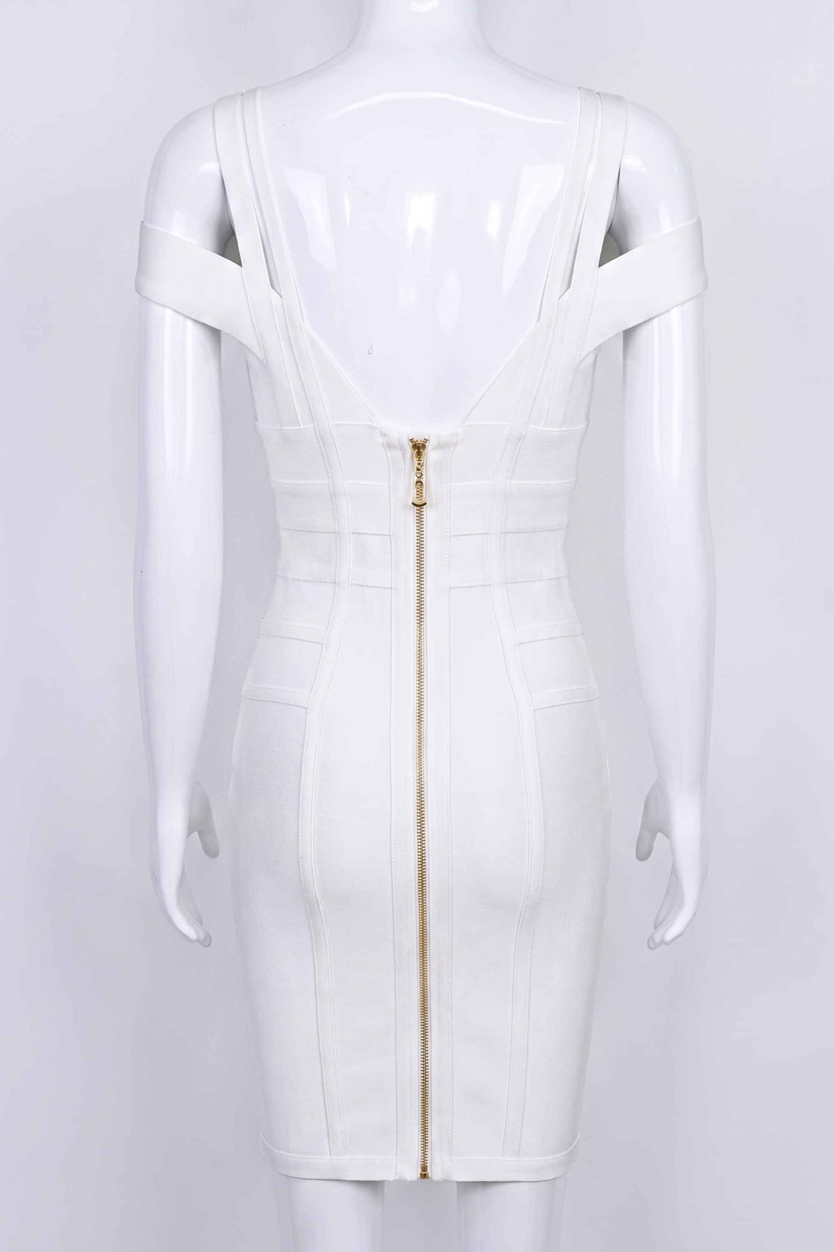 Woman wearing a figure flattering Sia Bandage Dress - Pearl White Bodycon Collection