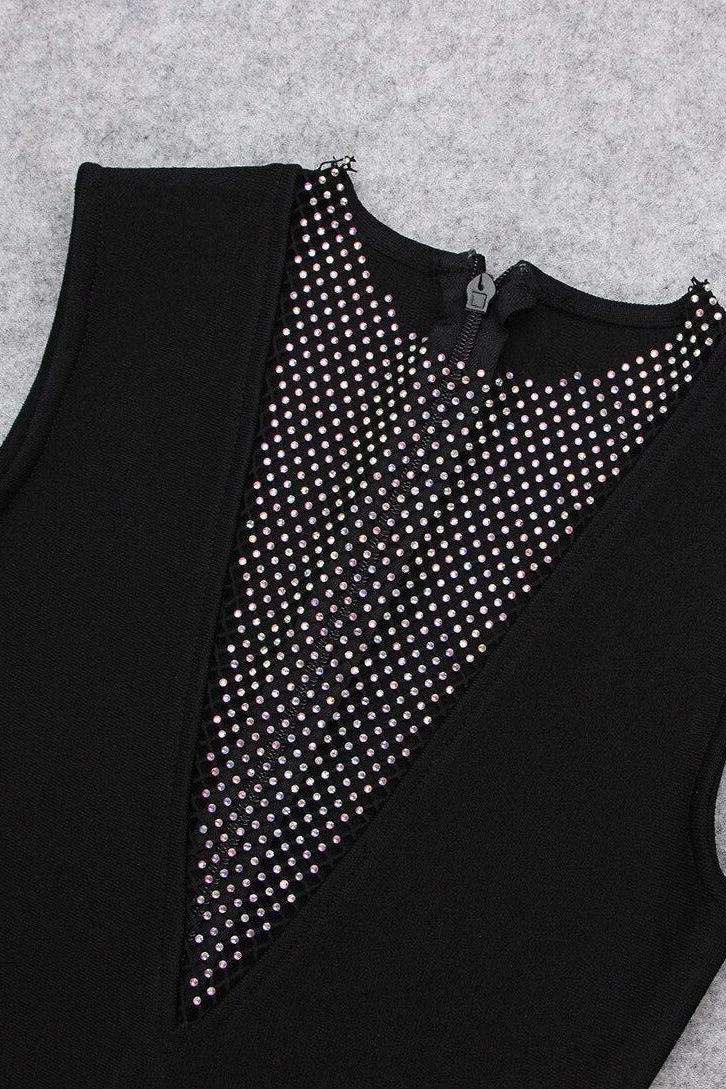 Woman wearing a figure flattering Sofie Bodycon Mini Dress - Classic Black BODYCON COLLECTION