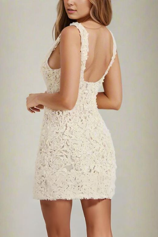 Woman wearing a figure flattering  Sonia Bodycon Mini Dress - White Pearl BODYCON COLLECTION