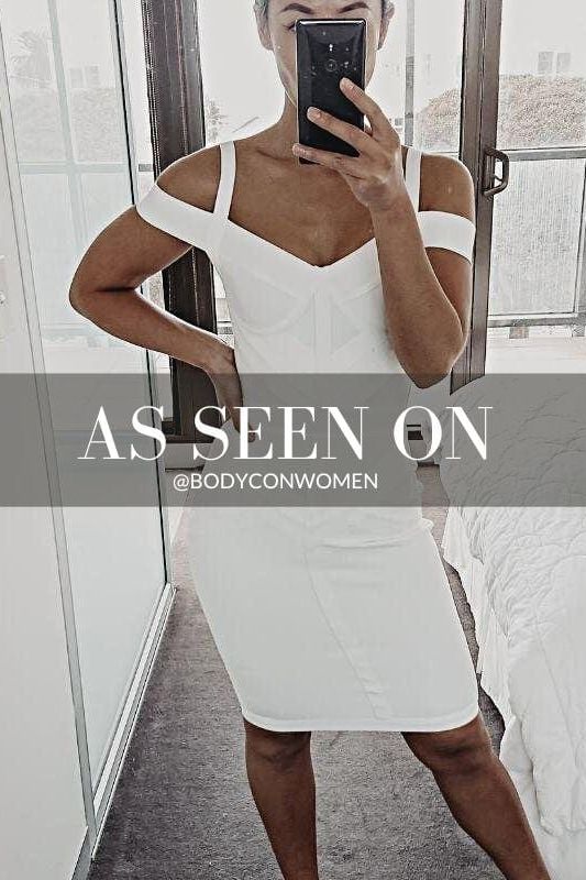 Woman wearing a figure flattering Sophia Bandage Dress - Pearl White Bodycon Collection