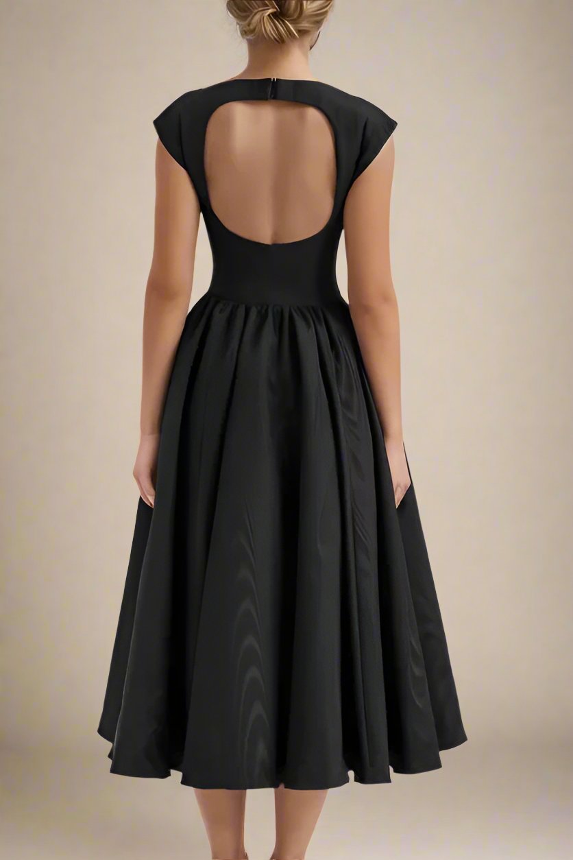 Woman wearing a figure flattering Stella Bodycon Midi Dress - Classic Black BODYCON COLLECTION