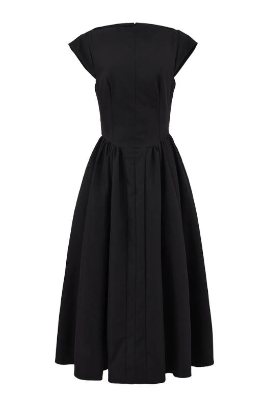 Woman wearing a figure flattering Stella Bodycon Midi Dress - Classic Black BODYCON COLLECTION