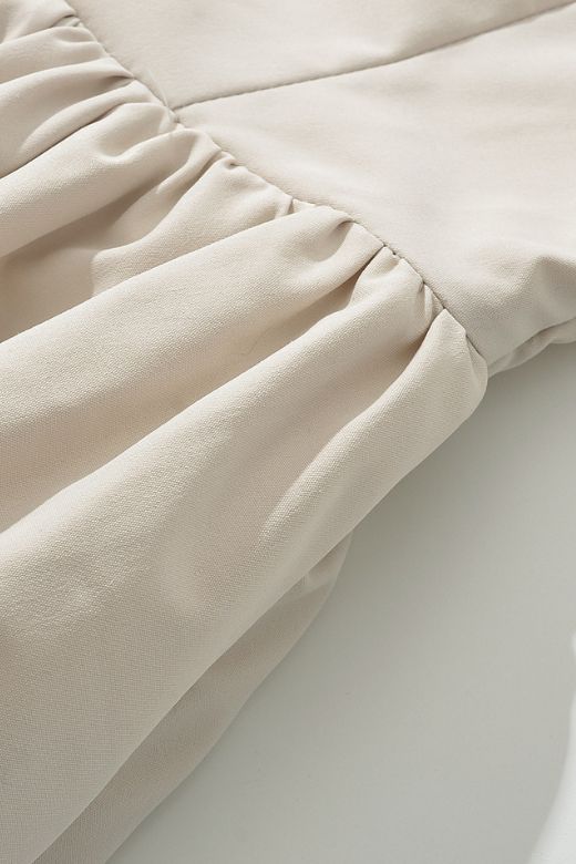 Woman wearing a figure flattering Stella Bodycon Midi Dress - Cream BODYCON COLLECTION