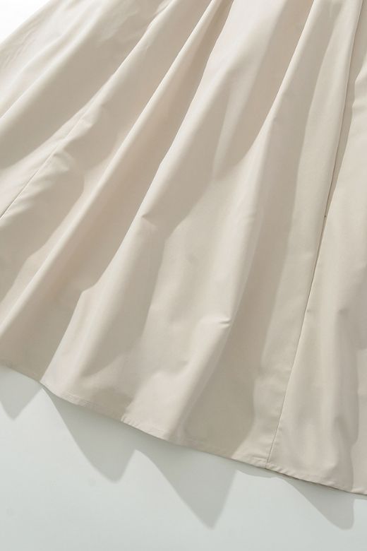 Woman wearing a figure flattering Stella Bodycon Midi Dress - Cream BODYCON COLLECTION