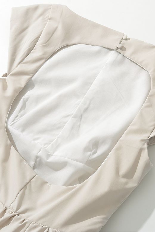 Woman wearing a figure flattering Stella Bodycon Midi Dress - Cream BODYCON COLLECTION