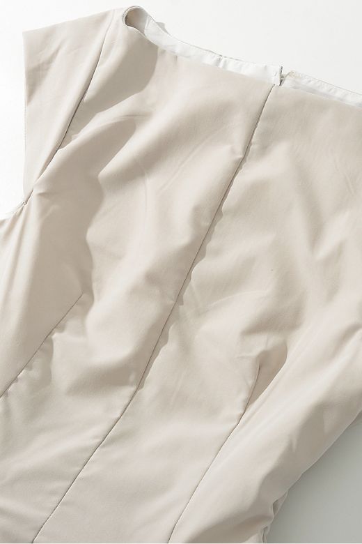 Woman wearing a figure flattering Stella Bodycon Midi Dress - Cream BODYCON COLLECTION