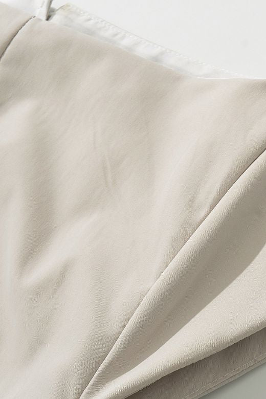 Woman wearing a figure flattering Stella Bodycon Midi Dress - Cream BODYCON COLLECTION