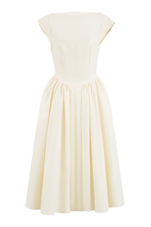 Woman wearing a figure flattering Stella Bodycon Midi Dress - Ivory White BODYCON COLLECTION