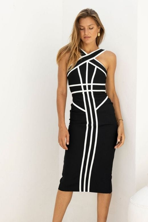 Woman wearing a figure flattering Suki Bandage Midi Dress - Classic Black BODYCON COLLECTION