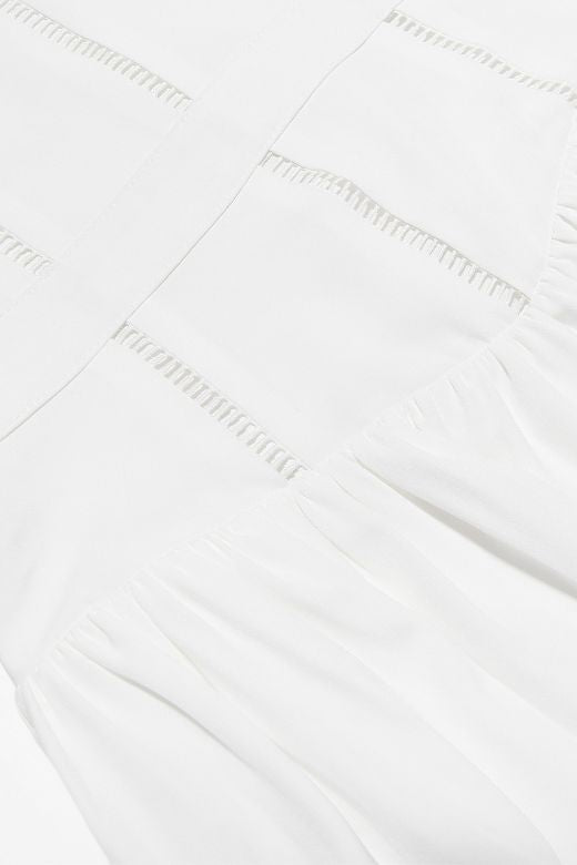 Woman wearing a figure flattering Tasmin Bodycon Midi Dress - Pearl White BODYCON COLLECTION