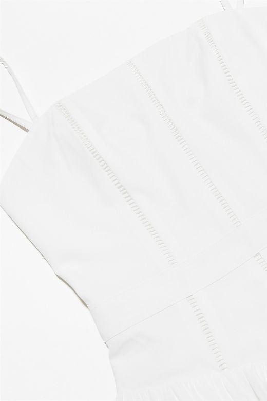 Woman wearing a figure flattering Tasmin Bodycon Midi Dress - Pearl White BODYCON COLLECTION