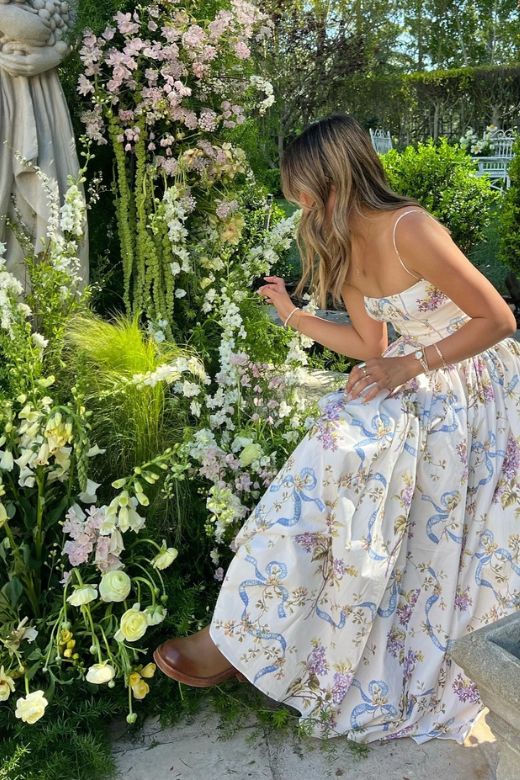 Woman wearing a figure flattering Tasmin Bodycon Midi Dress - Sky Blue BODYCON COLLECTION