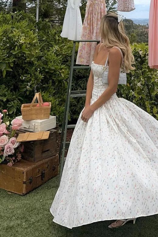 Woman wearing a figure flattering Tasmin Bodycon Midi Dress - White Print BODYCON COLLECTION