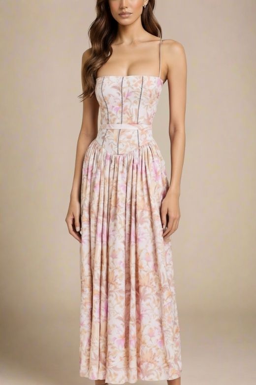 Woman wearing a figure flattering Tasmin Midi Dress - Pink Print BODYCON COLLECTION