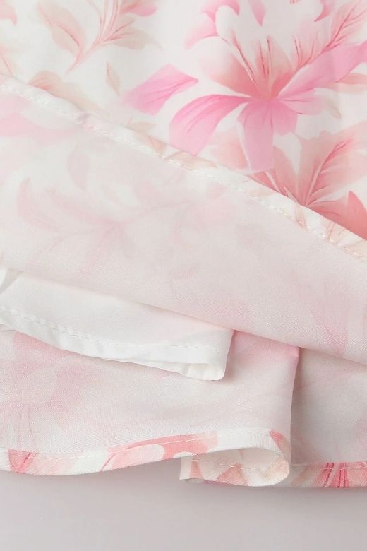 Woman wearing a figure flattering Tasmin Midi Dress - Pink Print BODYCON COLLECTION