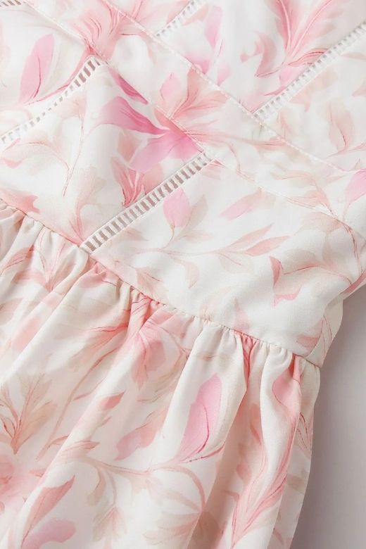 Woman wearing a figure flattering Tasmin Midi Dress - Pink Print BODYCON COLLECTION