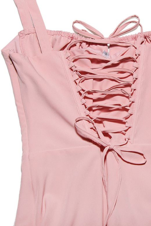 Woman wearing a figure flattering Taylor Bodycon Day Midi Dress - Dusty Pink BODYCON COLLECTION