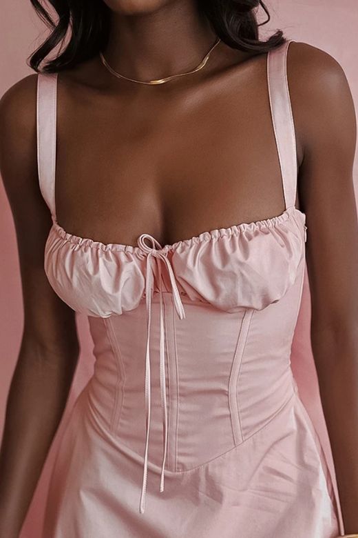 Woman wearing a figure flattering Taylor Bodycon Day Mini Dress - Dusty Pink BODYCON COLLECTION