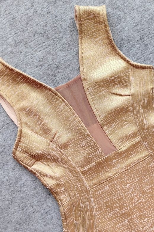 Woman wearing a figure flattering Tyler Bodycon Dress - Gold BODYCON COLLECTION Pty Ltd