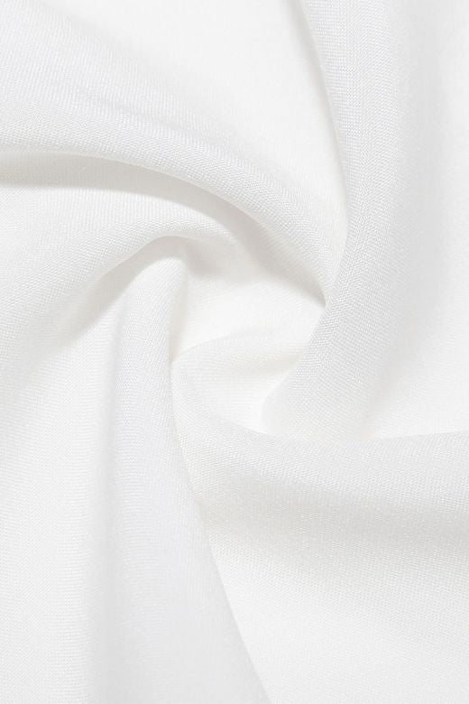 Woman wearing a figure flattering Valerie Corset Crop Top - Pearl White BODYCON COLLECTION